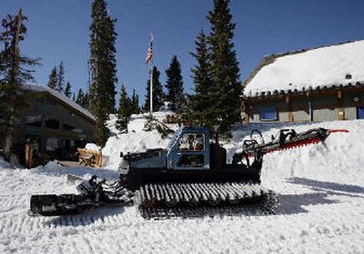 
A snowcat grooms the bottom of the hill at the Wolf Creek Ski Area near South Fork, Colo. 
 (Associated Press / The Spokesman-Review)