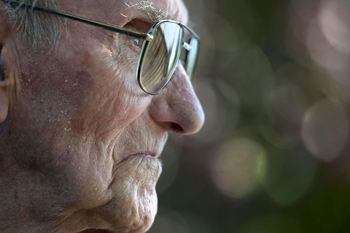 WWII fighter pilot Ralph Wandrey is photographed at Maplewood Assisted Living in Hayden on Wednesday, July 25, 2018. (Kathy Plonka / The Spokesman-Review)