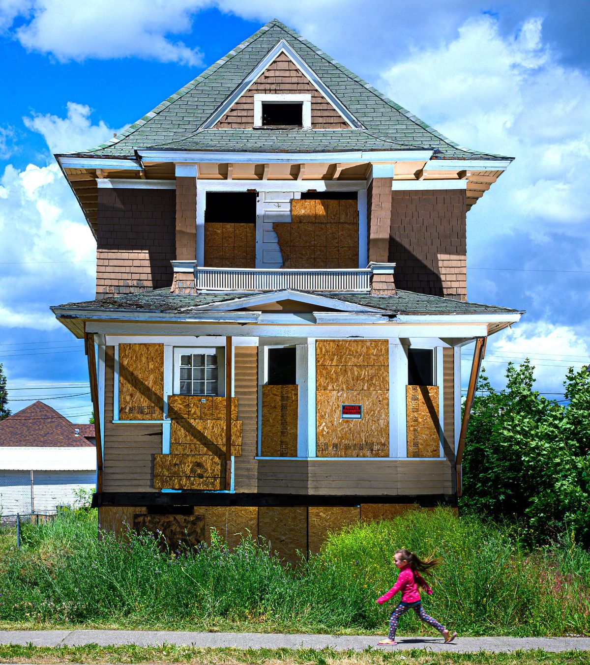 The city of Spokane has placed five “zombie houses” in the West Central neighborhood, including this one at 2130 W. Boone Ave., into receivership with an eye toward turning them into affordable housing. (Colin Mulvany / The Spokesman-Review)