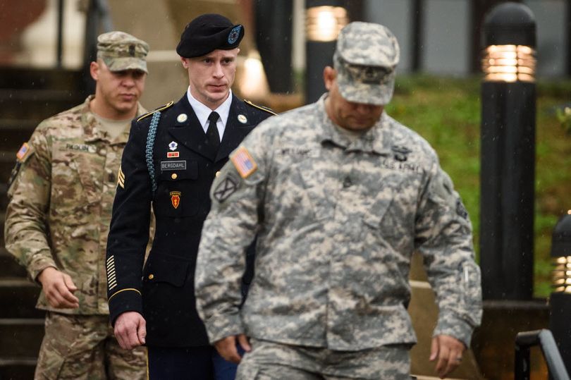 U.S. Army Sgt. Robert Bergdahl leaves the courthouse Tuesday, Dec. 22, 2015, after his arraignment hearing at Fort Bragg, N.C. Bergdahl, who disappeared in Afghanistan in 2009 and was held by the Taliban for five years, was scheduled to appear Tuesday before a military judge on charges of desertion and misbehavior before the enemy. (Andrew Craft /The Fayetteville Observer via AP) 
