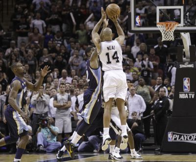 Gary Neal squares up for a 3-pointer before the regulation buzzer that allowed San Antonio to defeat Memphis in overtime. (Associated Press)