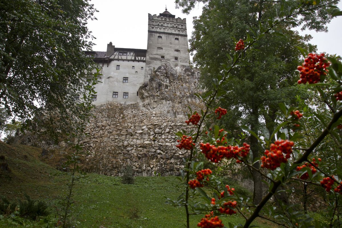 FILE - In this Saturday, Oct. 8, 2011 file picture, the Gothic Bran Castle, better known as Dracula Castle, is seen on a rainy day in Bran, in Romania