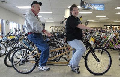 
Kathy Bruce, right, owner of Columbia Cycle & Hobby, Inc., will soon close the shop after 54 years in business. The bike shop was passed down to Kathy from her father, Bill Wardrop, left. 
 (Dan Pelle / The Spokesman-Review)