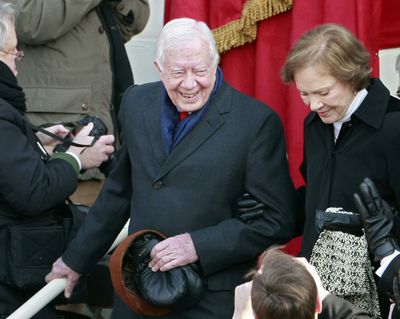 Former President Jimmy Carter and wife Rosalynn arrive at the inauguration of Barack Obama on the West Front of the Capitol Tuesday, Jan. 20, 2009 in Washington.  (Mark Wilson / AP)