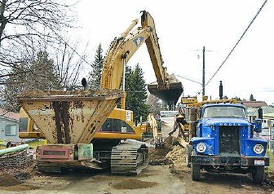 
Valleyway is rebuilt as part of the septic tank elimination program. Hooking up homes to sewer is one way to curbpollution from homeowners that threatens the health of the Spokane River.
 (J. BART RAYNIAK / The Spokesman-Review)