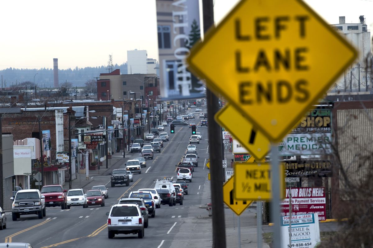 Traffic backs up on East Sprague Avenue on Wednesday. The city changed Sprague to a three-lane configuration more than a year ago. (Tyler Tjomsland)