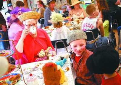 Martha Severn, left, watches her grandson Aidan Severn during a tea party in Cathy Tilton's first-grade class at Franklin Elementary School.
(Holly Pickett / The Spokesman-Review)