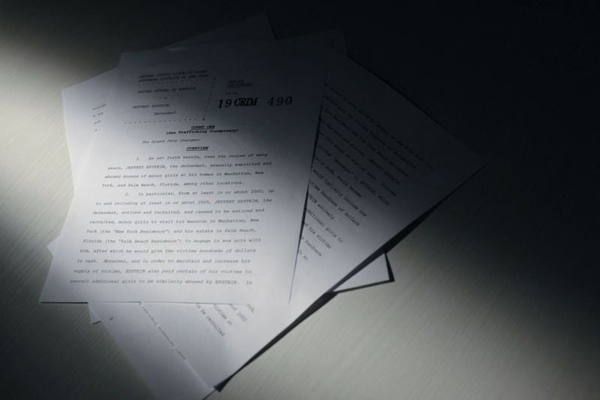 A newly-released unsealed indictment of disgraced late financier and sex offender Jeffrey Epstein is seen in this handout released by the U.S. Justice Department and printed and arranged for a photograph by Reuters in Washington, D.C., U.S., December 19, 2025. REUTERS/Jonathan Ernst (Jonathan Ernst)