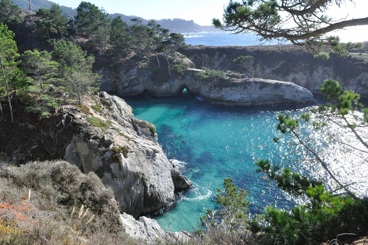 China Cove at Point Lobos State Natural Reserve is known for its emerald waters and whimsical arch.  (Adriana Janovich/For The Spokesman-Review)