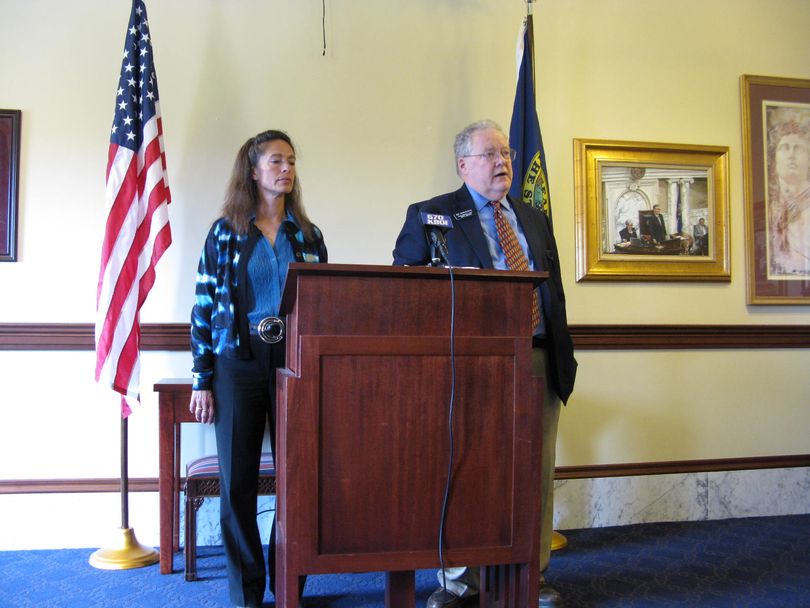 Senate Minority Leader Michelle Stennett, left, and House Minority Leader John Rusche, right, speak at a press conference after the conclusion of the legislative session on Friday (Betsy Z. Russell)