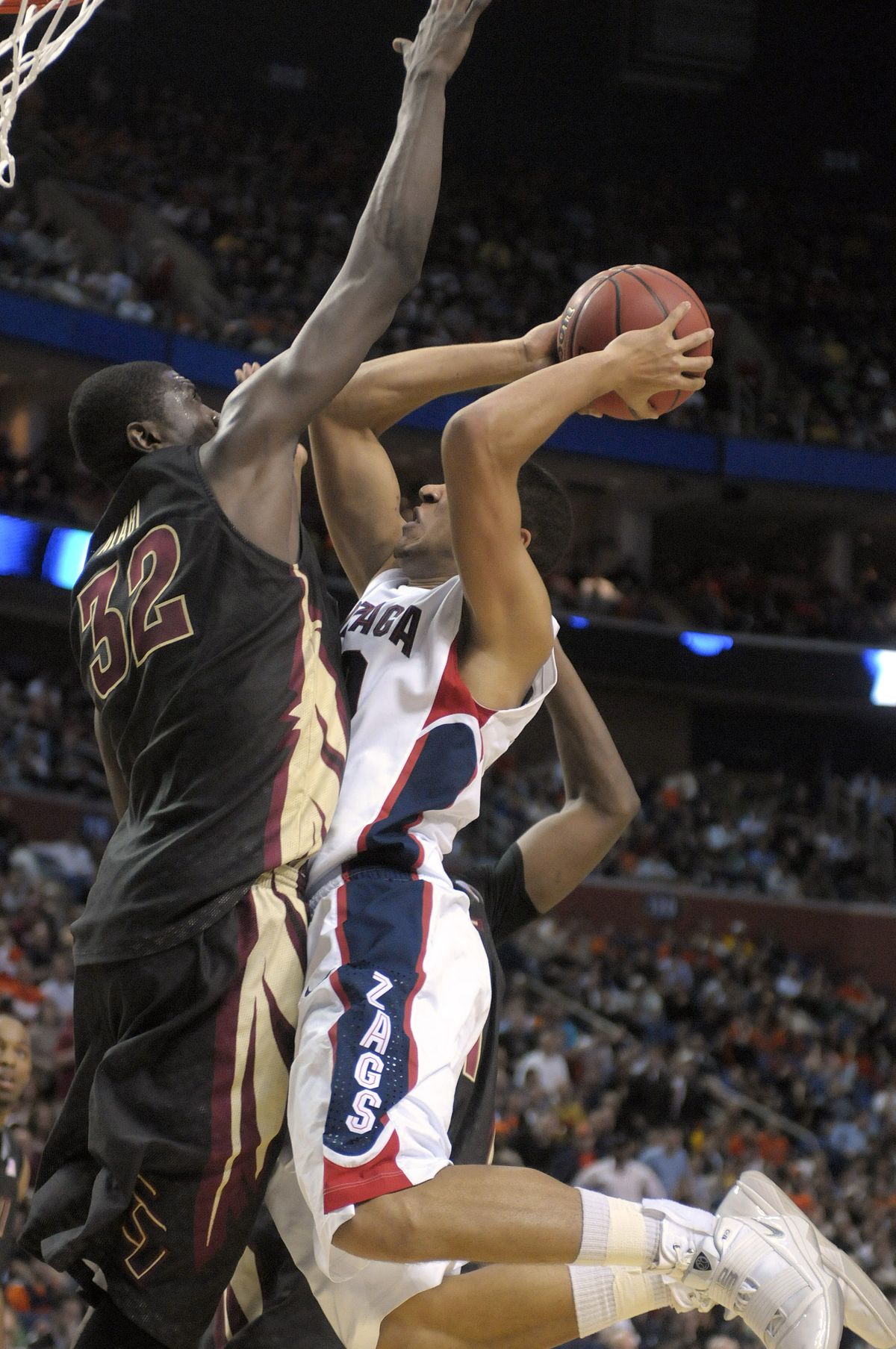 Elias Harris of Gonzaga drives to the basket against Solomon Alabi of Florida State in the second half of their opening-round NCAA tournament game Friday, March 19, 2010, in in Buffalo. Alabi blocked the shot, but Gonzaga went on to win, 67-60. (Christopher Anderson / Spokesman-Review)