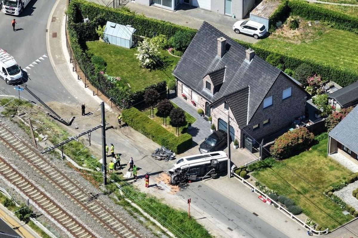 Belgian train hits school minivan, killing four including pupils