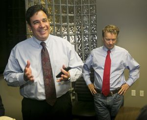 In this June 13, 2014, Idaho Statesman file photo, Rep. Raul Labrador, left, accompanies Sen. Rand Paul, right, for a brief media visit at Jackson's Jet Center in Boise while the two were on their way to the Idaho Republican Convention in Moscow.