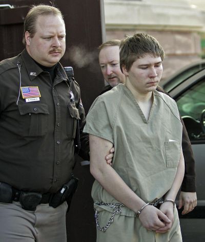 In this Friday, March 3, 2006, photo, Brendan Dassey, 16, is escorted out of a Manitowoc County Circuit courtroom in Manitowoc, Wis. A federal court in Wisconsin on Friday overturned the conviction of Dassey, a man found guilty of helping his uncle kill Teresa Halbach in a case profiled in the Netflix documentary “Making a Murderer.” (MORRY GASH / Associated Press)