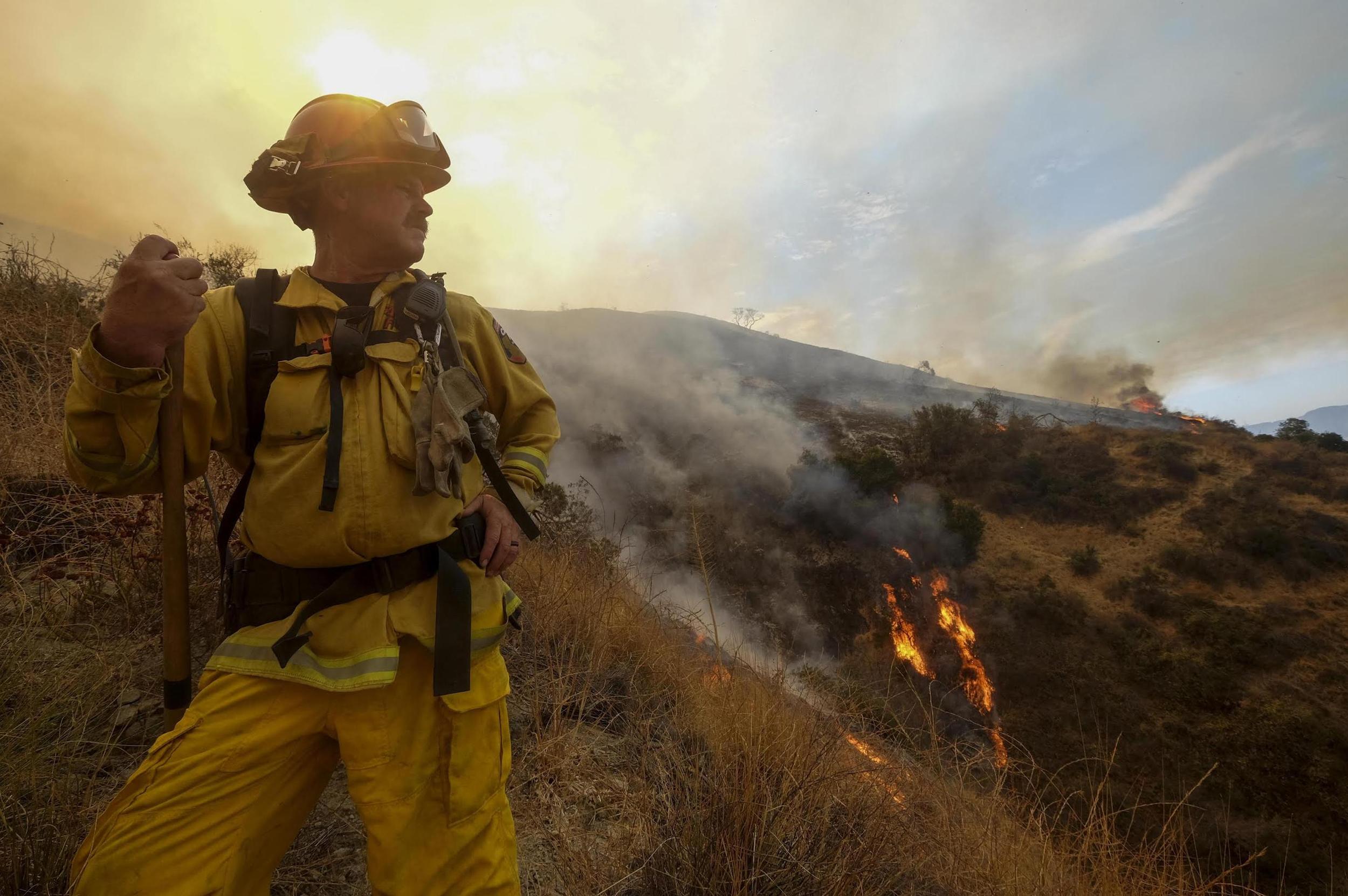 Wildfires surge amid scorching heat across U.S. West | The Spokesman-Review