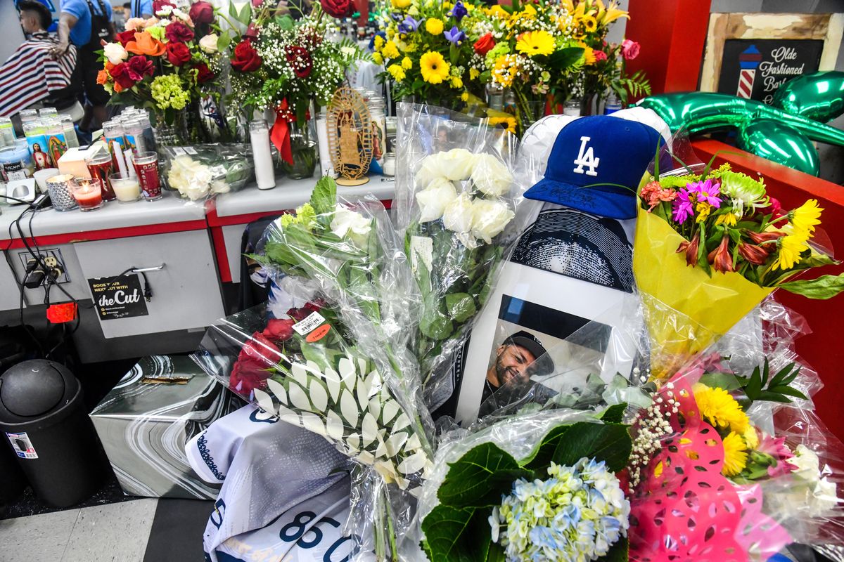 A memorial has sprung up Tuesday at Exclusive Barbershop for Daniel Martinez, who died after his friend allegedly shot him at Ichabod’s East last weekend. Daniel’s barber station is now covered in flowers, balloons and memorial candles.  (Dan Pelle/THE SPOKESMAN-REVIEW)