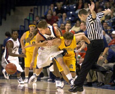 
Gonzaga's Derek Raivio steals the ball from Augustana's Marcus Blank during first-half action on Wednesday. 
 (Dan Pelle / The Spokesman-Review)