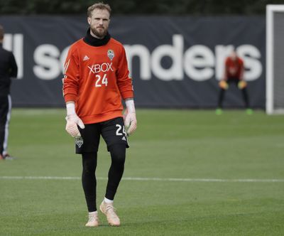 Seattle Sounders goalkeeper Stefan Frei walks on the pitch Wednesday  during MLS soccer training in Tukwila, Wash. The Sounders face the Portland Timbers Thursday in Seattle, in the second leg of the MLS soccer Western Conference semifinal round of the MLS playoffs. (Ted S. Warren / AP)