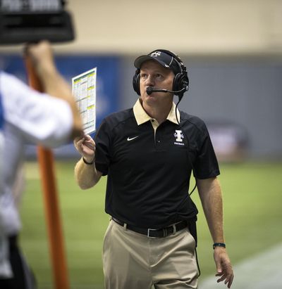 Idaho Vandals football coach Paul Petrino will take part in a news conference on Thursday with the expected announcement of a move to the Big Sky Conference in 2018. (Colin Mulvany / The Spokesman-Review)