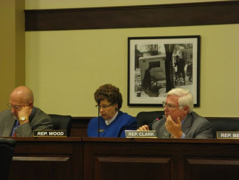 Rep. Jim Clark, R-Hayden Lake, argues against legislation designed to promote eventual collection of sales taxes on online sales. At left is Rep. Leon Smith, R-Twin Falls, co-sponsor of the bill, and Rep. JoAn Wood, R-Rigby, center, who earlier had cast a tie-breaking vote to introduce the measure. Wood switched sides Thursday and the bill was killed in the House Revenue & Taxation Committee on a tied, 9-9 vote, though an identical bill earlier passed the Senate unanimously. (Betsy Russell)