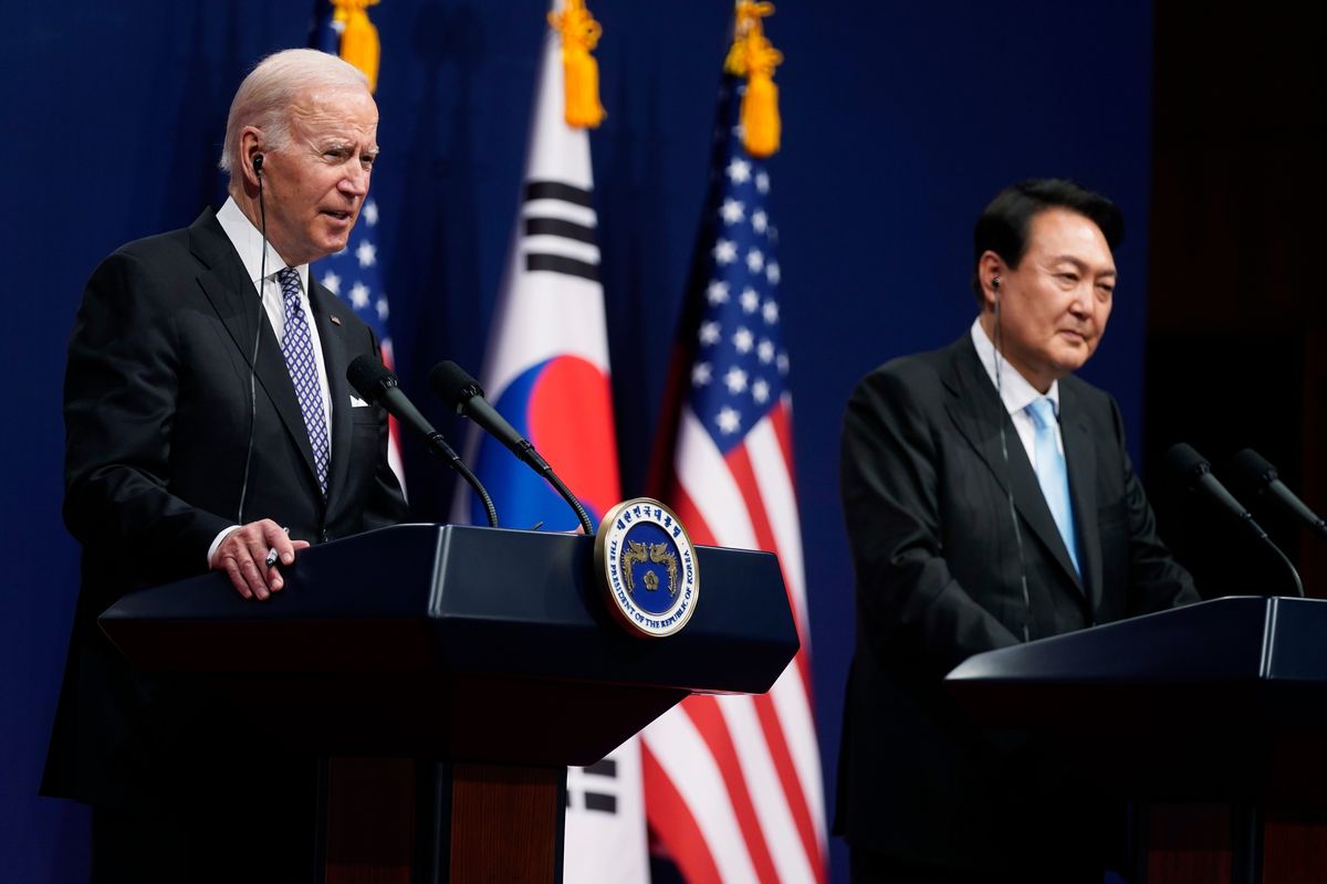 U.S. President Joe Biden, left, speaks as South Korean President Yoon Suk Yeol listens during a news conference Saturday in Seoul, South Korea.  (Evan Vucci)