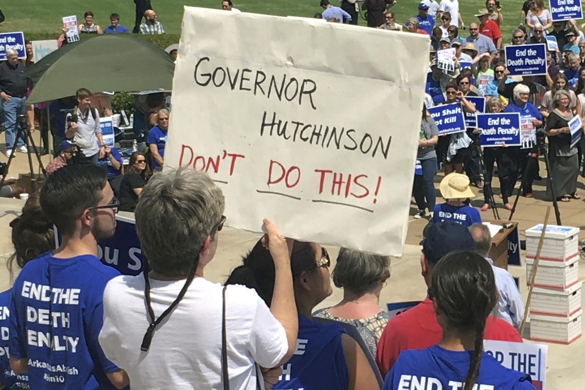 Protesters gather outside the state Capitol building on Friday, April 14, 2017, in Little Rock, Ark., to voice their opposition to Arkansas