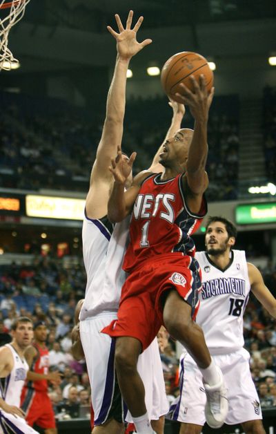 New Jersey Nets guard Rafer Alston, right, had a tough time finding the basket in the Nets’ 16th straight loss. (Associated Press)