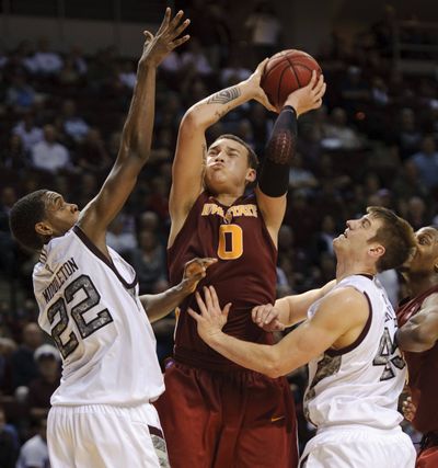 Transfer Jordan Railey, center, won’t debut for awhile. (Associated Press)