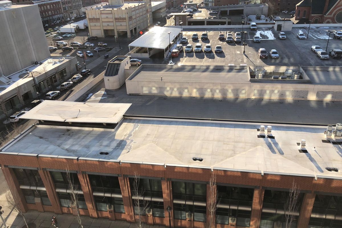 2019 – The Spokesman-Review production facility, which has housed the newspaper’s printing plant since 1981, takes up most of a city block at Monroe Street and Sprague Avenue, shown Friday, March 22, 2019. The block once had a mix of uses, including a furniture store, several residence hotels, a gas station various parking lots. (Jesse Tinsley / The Spokesman-Review)