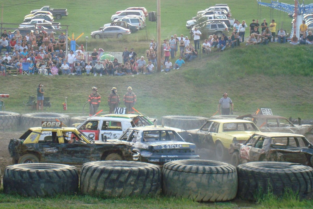 Demolition derby drivers compete in the V-8 engine class at the Valley District Fair on Wednesday in Reedsville, W.Va. Soaring scrap metal prices are making expendable cars more expensive and harder to find. Photos by  (Photos by Associated Press / The Spokesman-Review)