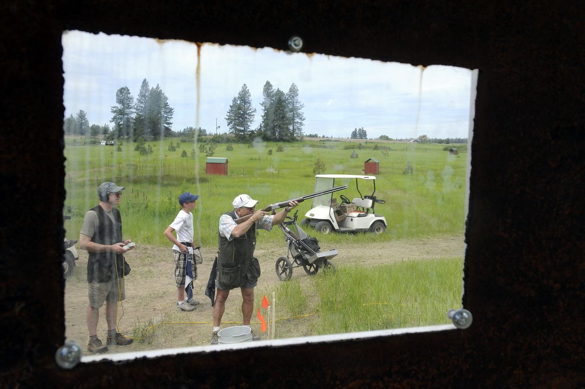 Jim Stack of Kirkland, Wash., takes his shots at the Washington State Sporting Clays Championships in June  at Landt Farms near Four Mounds.  (Photos by Dan Pelle / The Spokesman-Review)