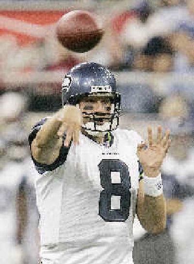 
Matt Hasselbeck completed 8 of 9 passes in limited action for Seattle.
 (Associated Press / The Spokesman-Review)