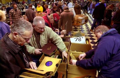 
Crowds inspect goods at KPBX sale.
 (The Spokesman-Review)