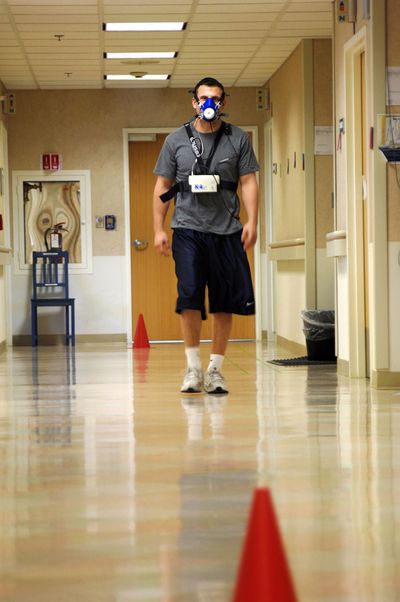 A volunteer walks a hallway wearing instruments that measure oxygen consumption. The 50-year-long Baltimore Longitudinal Study of Aging has provided invaluable data on the aging process. Washington Post (Washington Post / The Spokesman-Review)