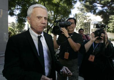 
Actor Robert Blake is followed by the news media as he enters court in Burbank, Calif., on Friday before the verdict is read in his wrongful-death lawsuit. 
 (Associated Press / The Spokesman-Review)