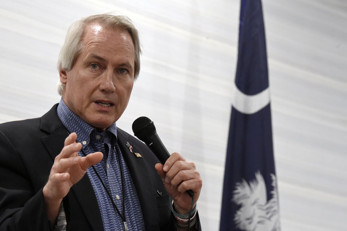 In this April 30, 2021 photo, pro-Trump attorney L. Lin Wood, a candidate for chairman of the South Carolina Republican Party, speaks to attendees of the Richland County GOP convention in Columbia, S.C. A federal judge is considering whether to order financial penalties or other sanctions against some of former President Donald Trump