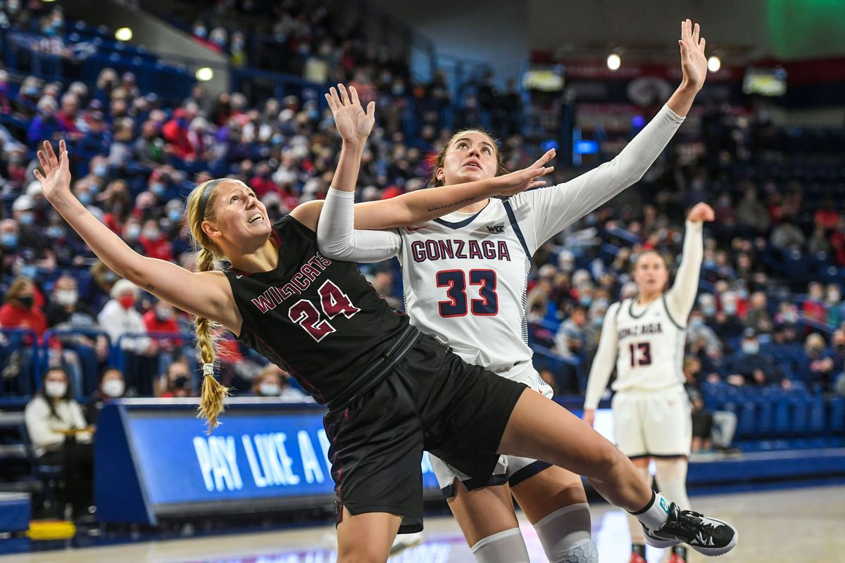 Gonzaga forward Melody Kempton (33) clears space for a rebound against Central Washington University forward Kassidy Malcolm (24), after a Ciera Walker 3-point shot attempt Nov. 6, 2021 in the McCarthey Athletic Center.  (DAN PELLE/THE SPOKESMAN-REVIEW)