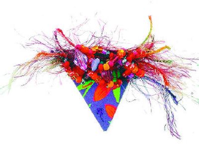 The annual Spectrum Studio Spring Show features the work of 10 artists, including wearable art pins by Joanne Tatman.
(Spectrum Studio / The Spokesman-Review)