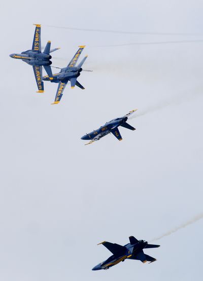 Flying F/A-18 Hornets, the U.S. Navy’s Blue Angels perform precision aerobatic maneuvers at the Barksdale Air Force Base Defenders of Liberty Air Show on May 10 in Barksdale, La. The (Shreveport) Times (Henrietta WIldsmith The (Shreveport) Times / The Spokesman-Review)