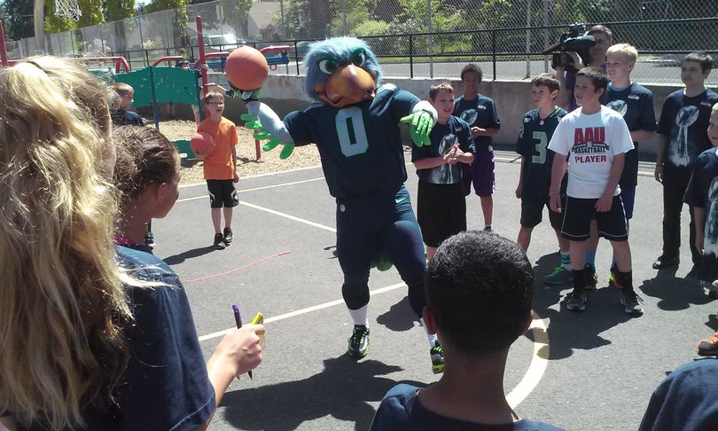 Seattle Seahawks' mascot Blitz plays with Wilson Elementary School students in 2014. (Jody Lawrence-Turner)