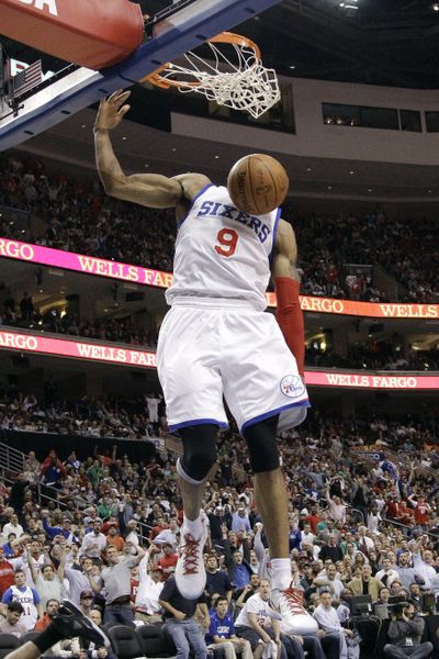 Philadelphia 76ers' Andre Iguodala dunks the ball in the second half of Game 6. His late free throws were the winning points. (Associated Press)