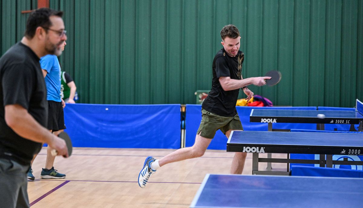 Cody Holland fires a blistering return shot during West Central Table Tennis play at the Girls Scouts Building, Sunday, March 17, 2024, in Spokane.  (DAN PELLE/THE SPOKESMAN-REVIEW)