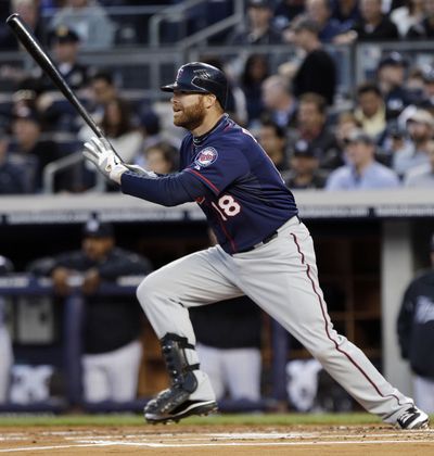 Twins catcher Ryan Doumit had four RBIs in loss to New York Yankees. (Associated Press)