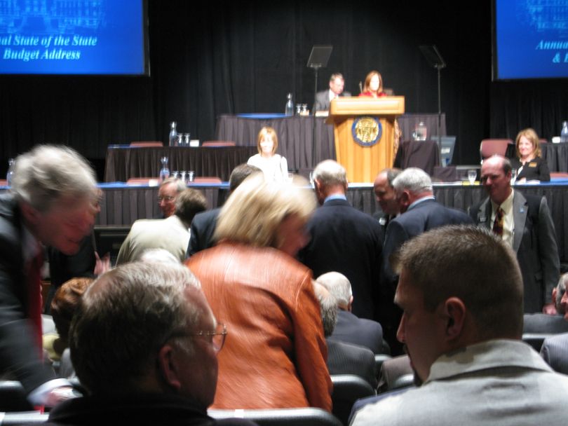 Senators file in to join House members for the Idaho State of the State address at the BSU Special Events Center. (Betsy Russell / The Spokesman-Review)
