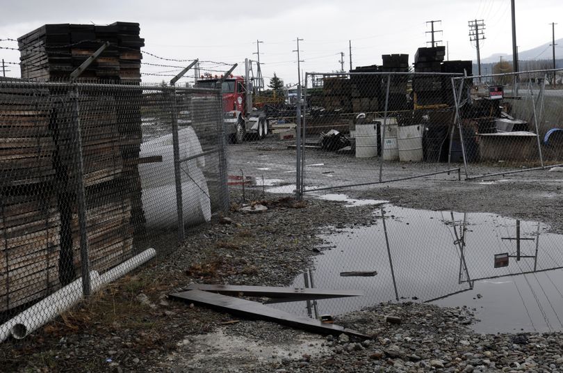 Construction on theBarker Bridge has been completed for almost a year, but the contractor, Morgen and Oswood of Great Falls, has yet to clean up the storage site owned by the Spokane Valley Fire Department at the corner of Barker and Euclid. (J. Bart Rayniak)