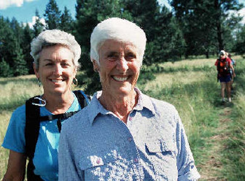 
Jan Griffitts, left, stands behind Mickinnick Trail godmother Nicky Pleass as they set out to hike from the new trailhead at the edge of Sandpoint in 2005.
 (Rich Landers / The Spokesman-Review)