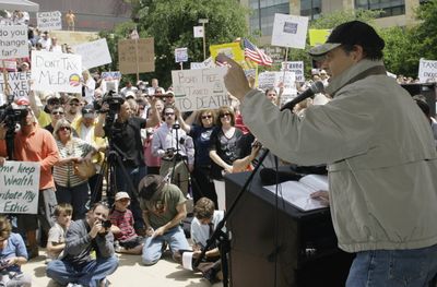 Gov. Rick Perry  speaks during a “Don’t Mess With Texas” tea party rally at City Hall  in Austin, Texas, on Wednesday.  It was one of a series of tax-day protests across the country.  (Associated Press / The Spokesman-Review)