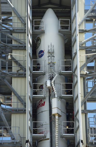 The unmanned Minotaur V rocket was launched Friday with a robotic explorer that will study the lunar atmosphere. (Associated Press)