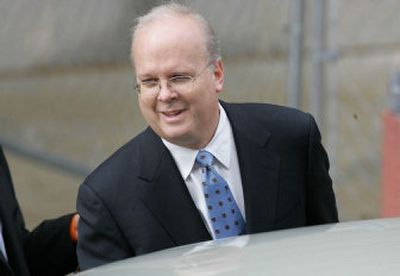 
Presidential adviser Karl Rove leaves U.S. District Court in Washington after testifying for the fourth time before a grand jury in the CIA leak probe Friday.
 (Associated Press / The Spokesman-Review)