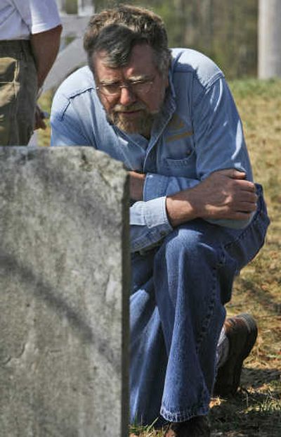 Tom Giffin examines a gravestone in the Aldrich Cemetery in Hartland, Vt. Associated Press
 (Associated Press / The Spokesman-Review)